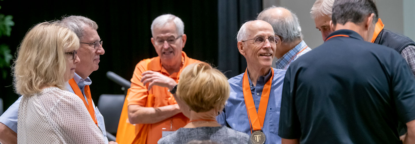 Alumni Mingling at the Hall of Fame Ceremony