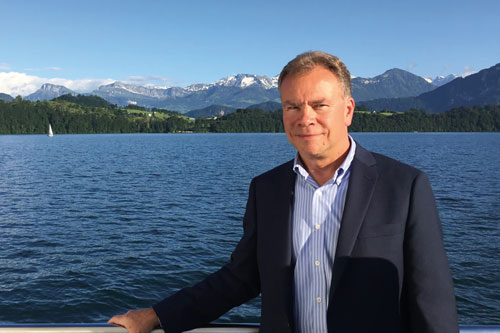 Joseph Knecht next to a lake